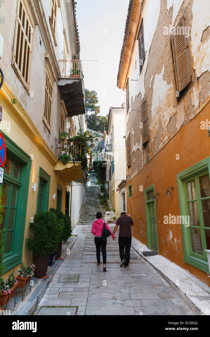 A couple walking at alley in Nafplion city. Argolis, Peloponnese, Greece Stock Photo