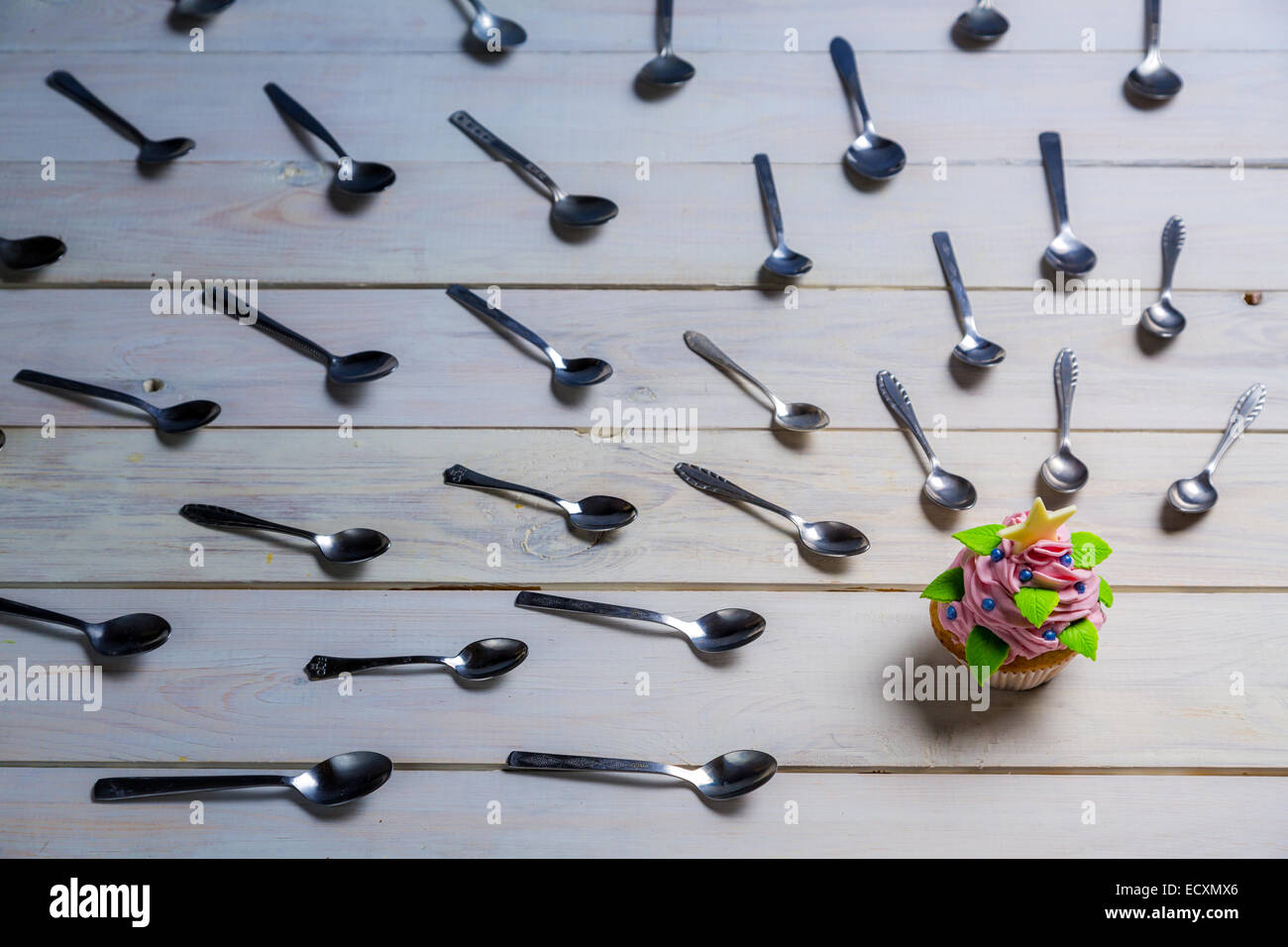 Witchhunt by teaspoon on a muffin Stock Photo