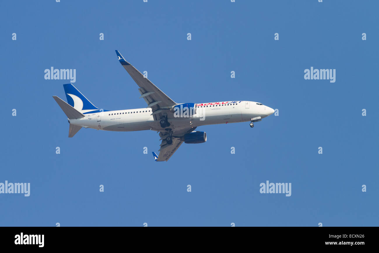 ISTANBUL, TURKEY - AUGUST 16, 2014: Anadolu Jet Airlines Boeing 737-800 landing to Sabiha Gokcen Airport. AnadoluJet is low-cost Stock Photo
