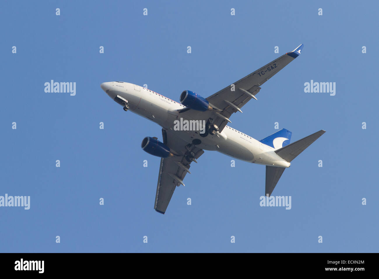 ISTANBUL, TURKEY - AUGUST 17, 2014: Anadolu Jet Airlines Boeing 737-700 landing to Sabiha Gokcen Airport. AnadoluJet is low-cost Stock Photo