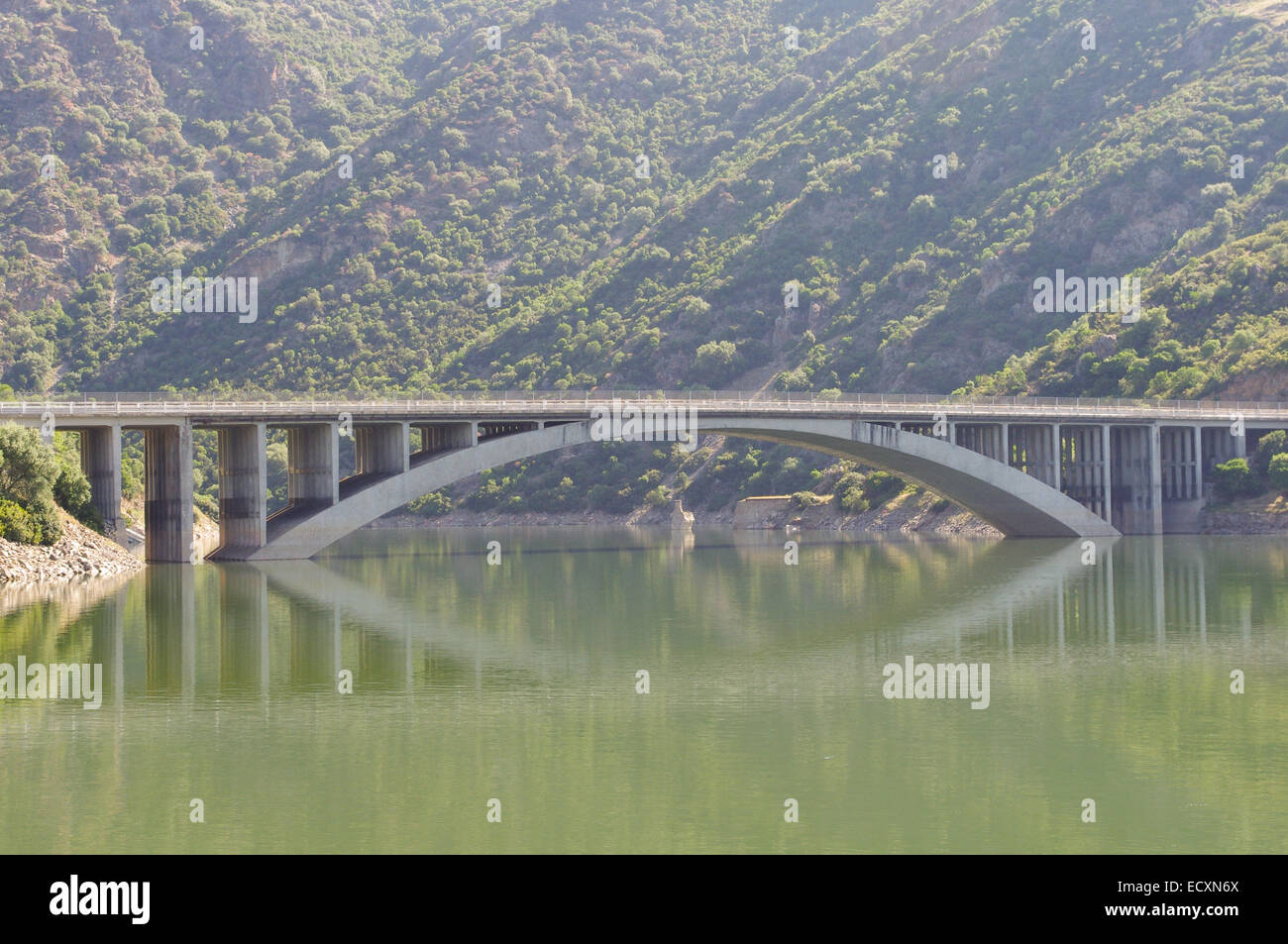Concrete bridge reflection in the lake Stock Photo