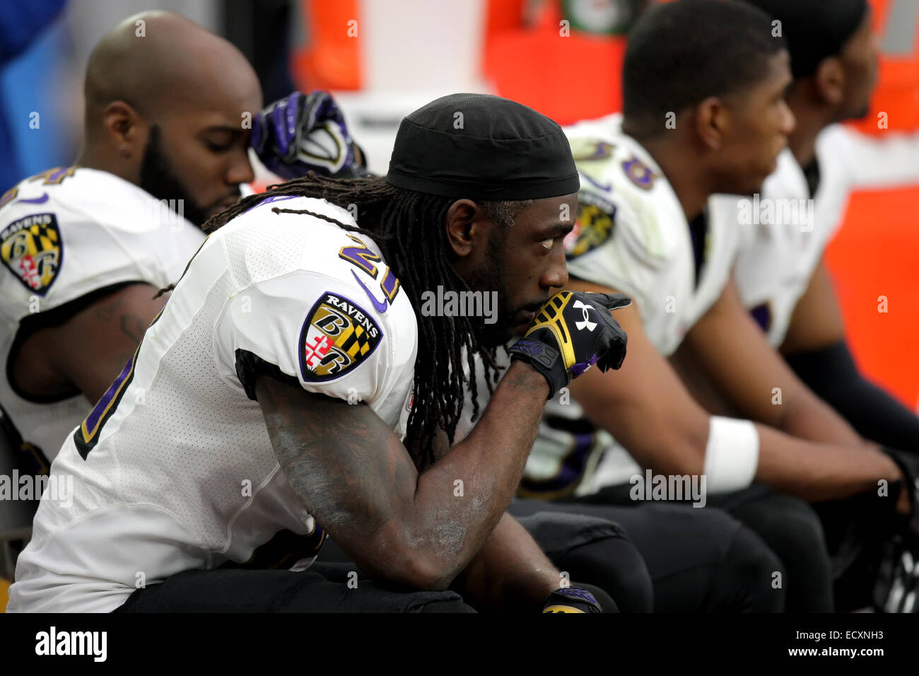 Houston, Texas, USA. 21st Dec, 2014. Baltimore Ravens cornerback Lardarius Webb (21) observes action while on the bench during the NFL football game between the Houston Texans and the Baltimore Ravens from NRG Stadium in Houston, TX. Houston won, 25-13. Credit:  Cal Sport Media/Alamy Live News Stock Photo