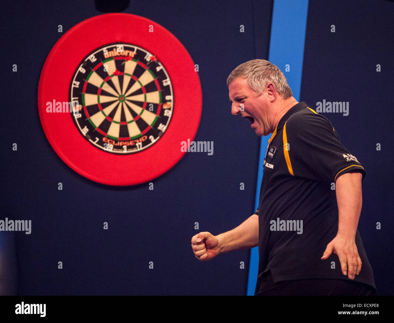 London, UK. 21st Dec, 2014. William Hill World Darts Championship. Wayne Jones [ENG] celebrates a finish during his game with Dean Winstanley (26) [ENG]. Winstanley won the match 3-2 Credit:  Action Plus Sports/Alamy Live News Stock Photo