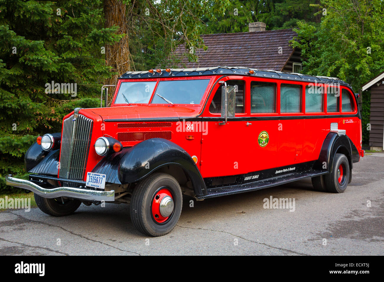 Red Jammers are buses used at Glacier National Park in the United States to transport park visitors. Stock Photo