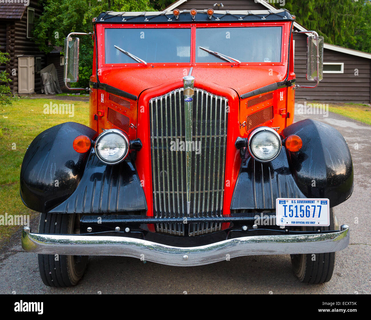 Red Jammers are buses used at Glacier National Park in the United States to transport park visitors. Stock Photo