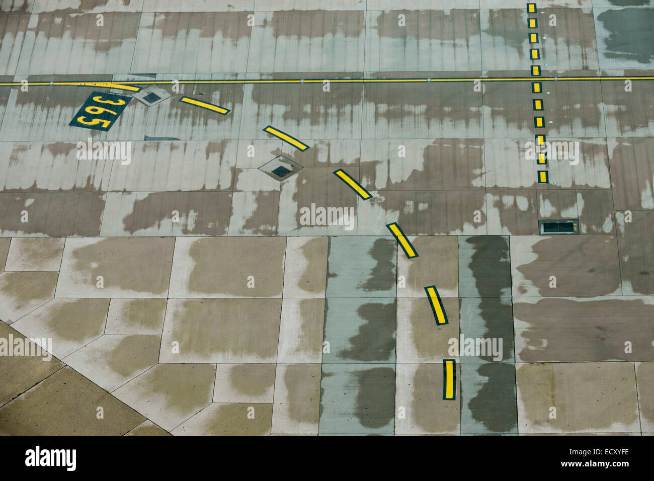 High aerial view (from control tower) of Heathrow airport aviation markings on concrete landscape. Stock Photo