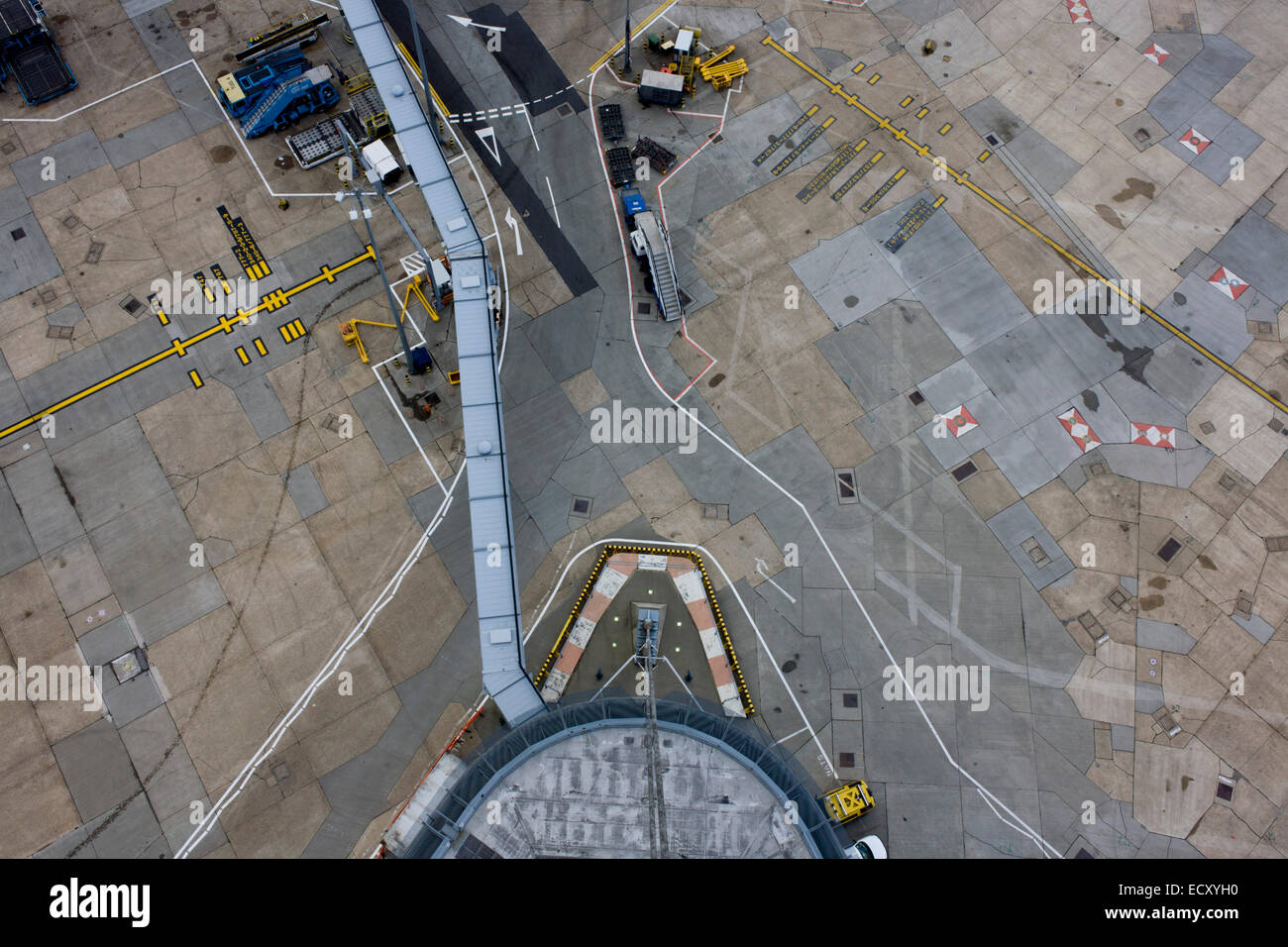 High aerial view (from control tower) of Heathrow airport aviation markings on concrete landscape. Stock Photo