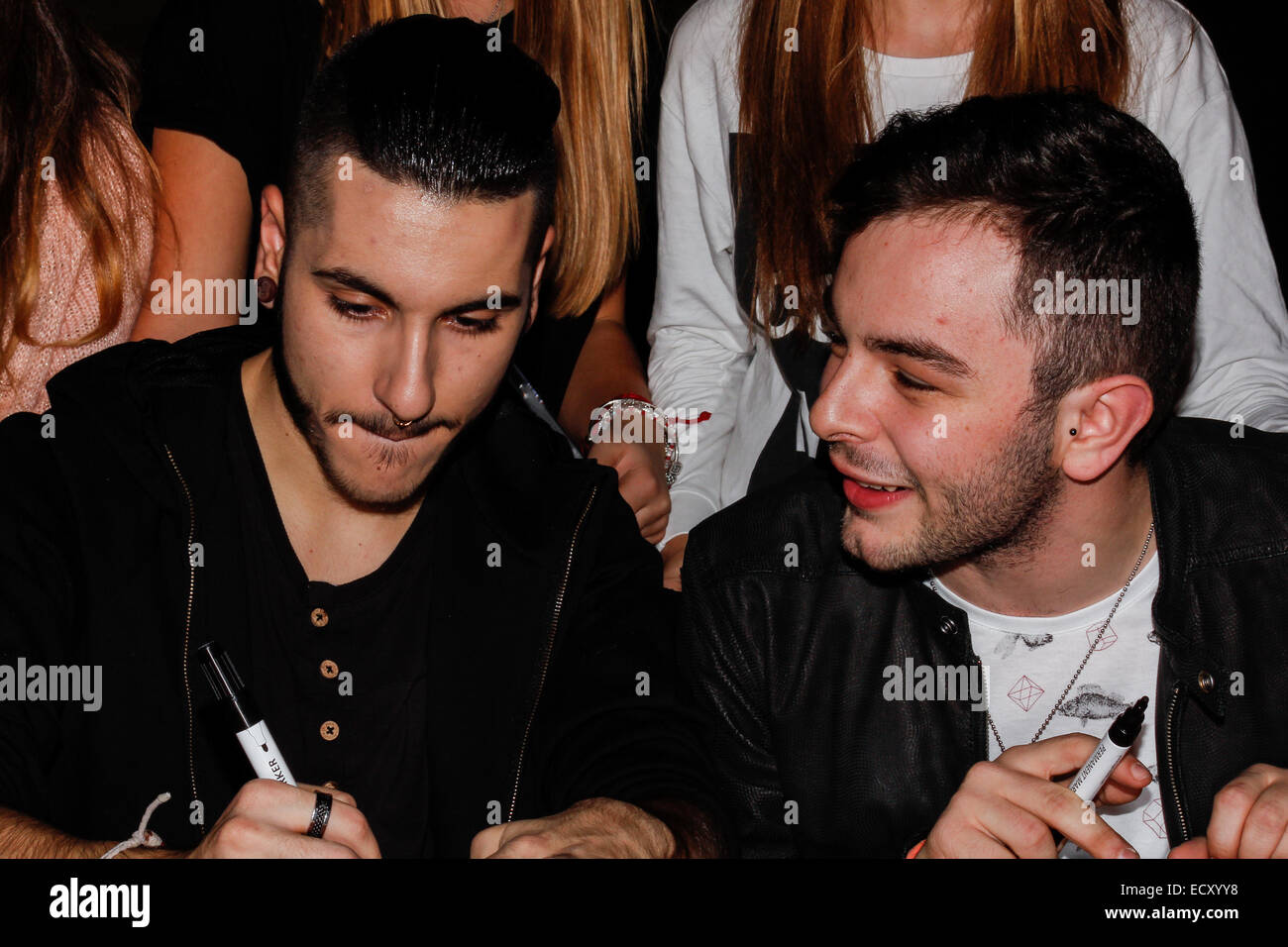 Italy. 21st Dec, 2014. The X Factor 2014 winner, Lorenzo Fragola (right), and Madh, second placer at the shopping center 8 Gallery to sign copies of EP to their fans. Credit:  Elena Aquila/Pacific Press/Alamy Live News Stock Photo