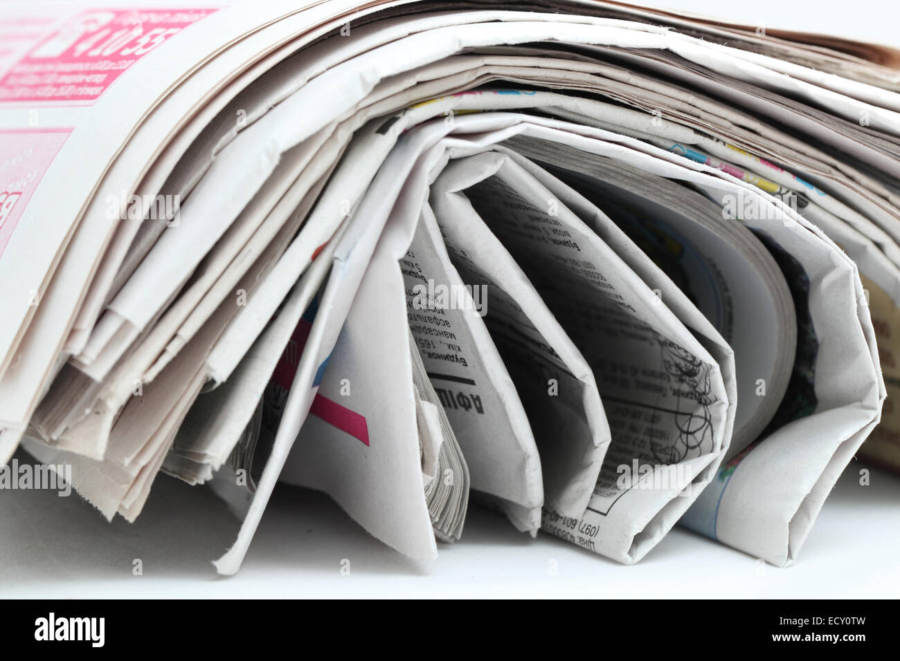 newspaper roll isolated on white background Stock Photo Alamy