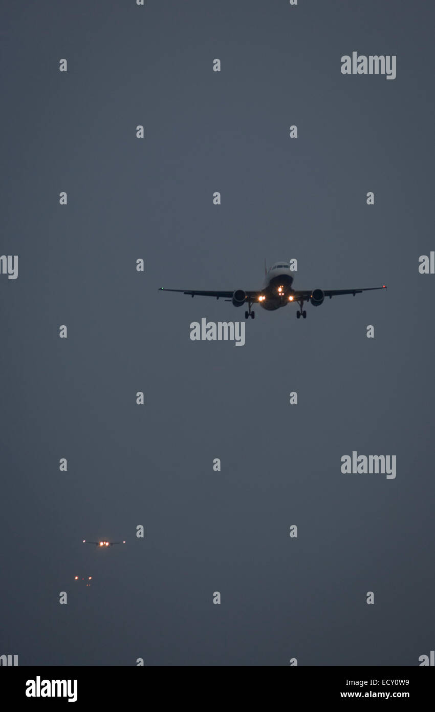 Airliners landing at London Heathrow airport. Stock Photo