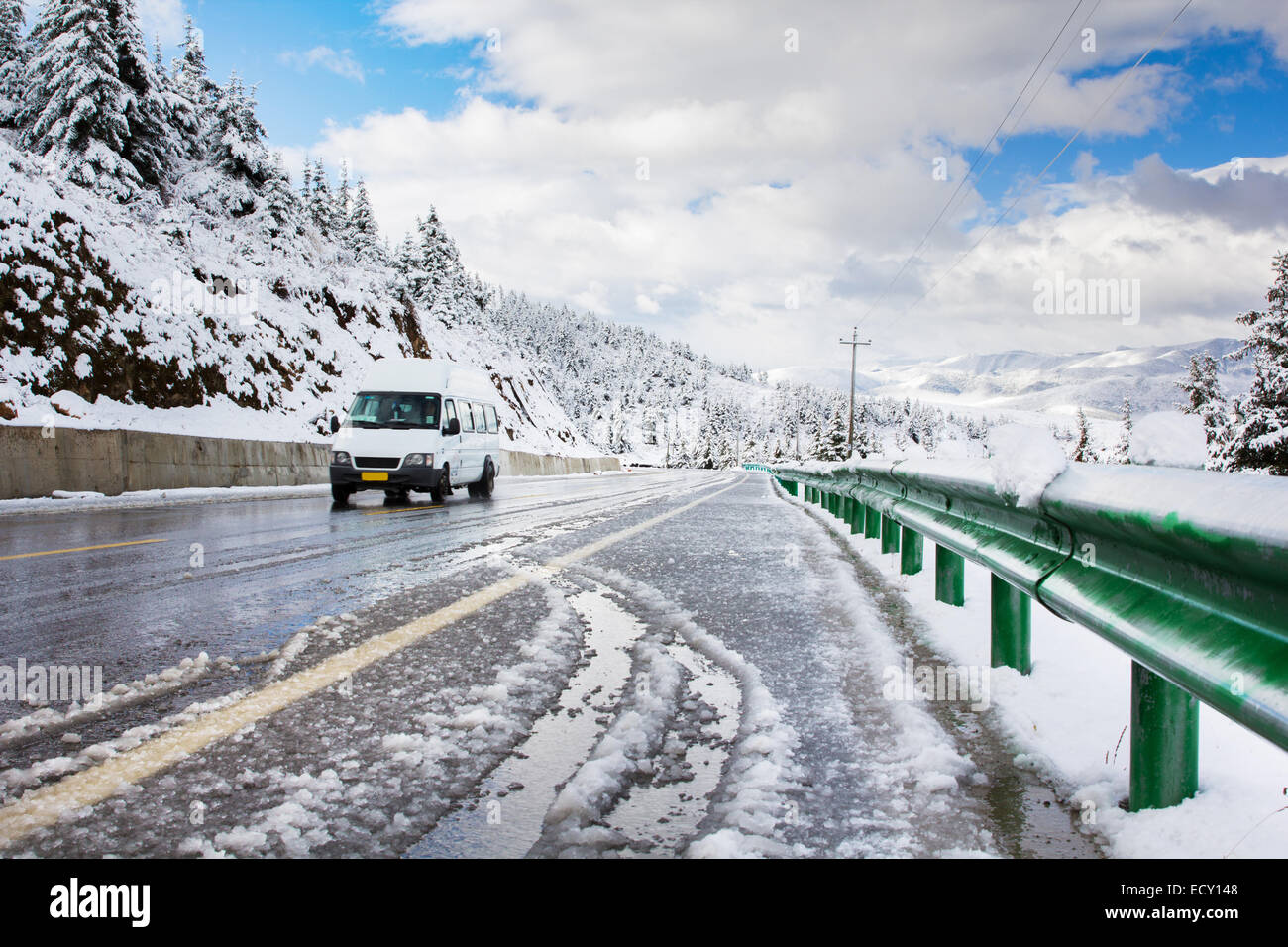 Drive car on slippery road from melt snow Stock Photo