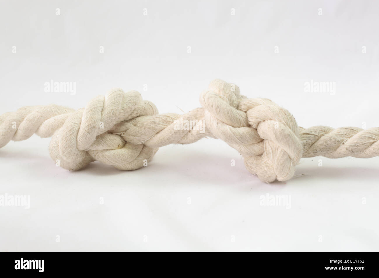 another side of multiple figure-eight knot tied on thick jute rope