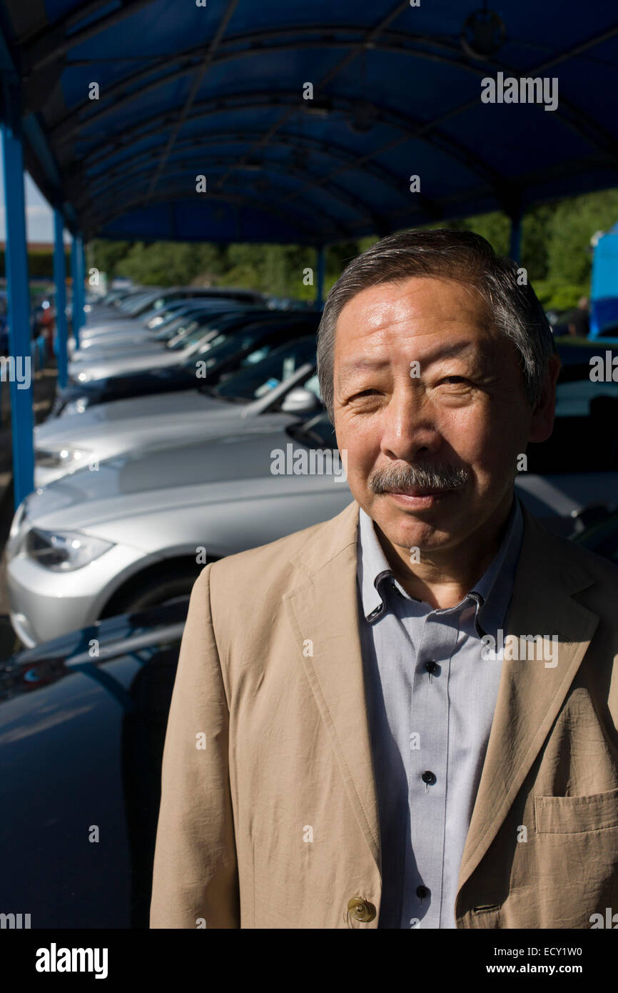 Japanese entrepreneur, Tetsuro Hama at his north London car dealership business.   From the chapter entitled 'The Price of Happi Stock Photo