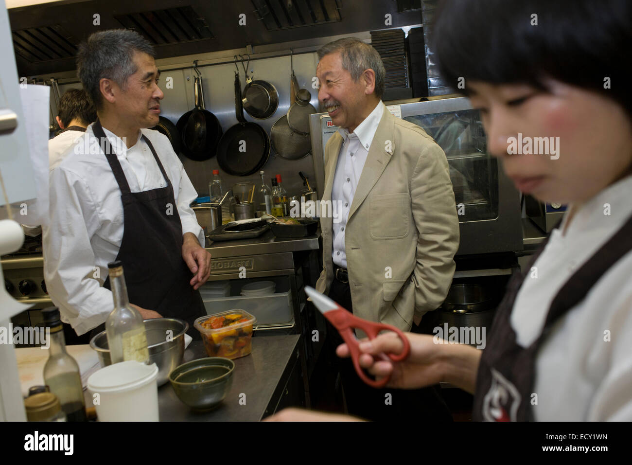 Japanese entrepreneur, Tetsuro Hama with sushi chef and old friend, Kaoru Yamamoto at his 'So' restaurant business, Soho, London Stock Photo
