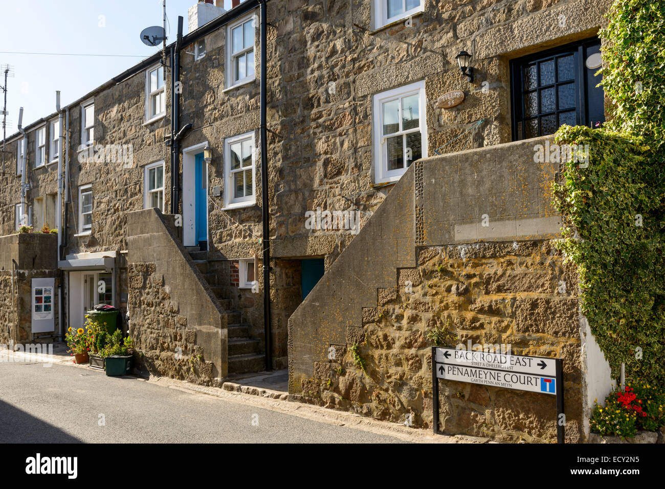 foreshortening of ancient touristic village on the north coast of Cornwall with old houses with outside stairs Stock Photo