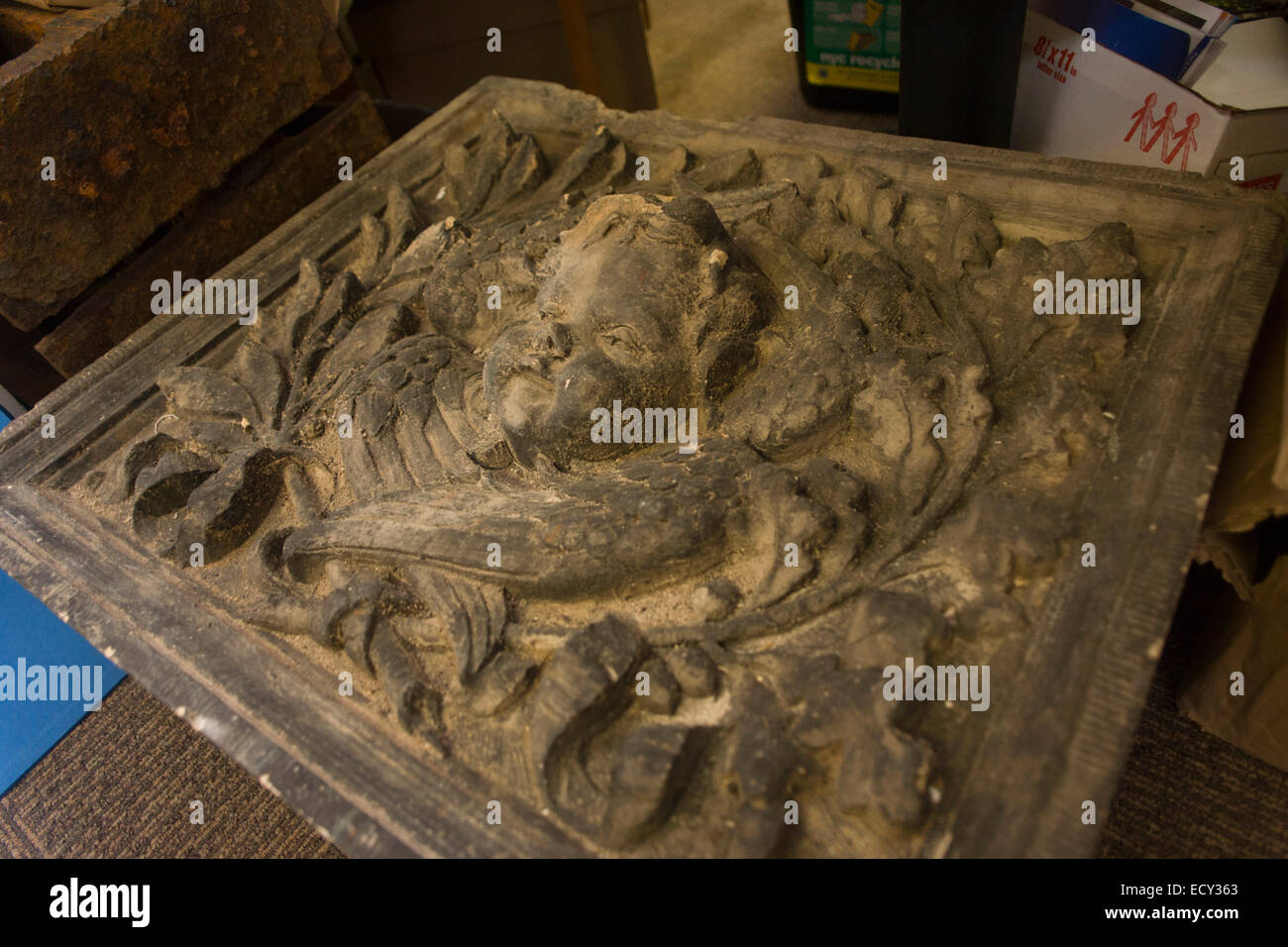 Fire damaged block of carved masonry held in the City of New York Buildings Department, Manhattan Stock Photo