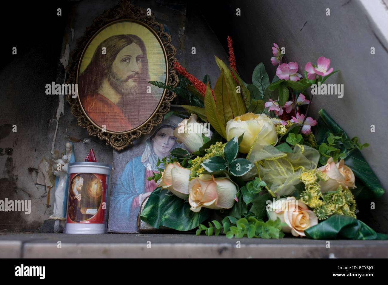 Religious edicola (aedicula votiva) shrine featuring Jesus and the Madonna, Naples, Italy. Stock Photo