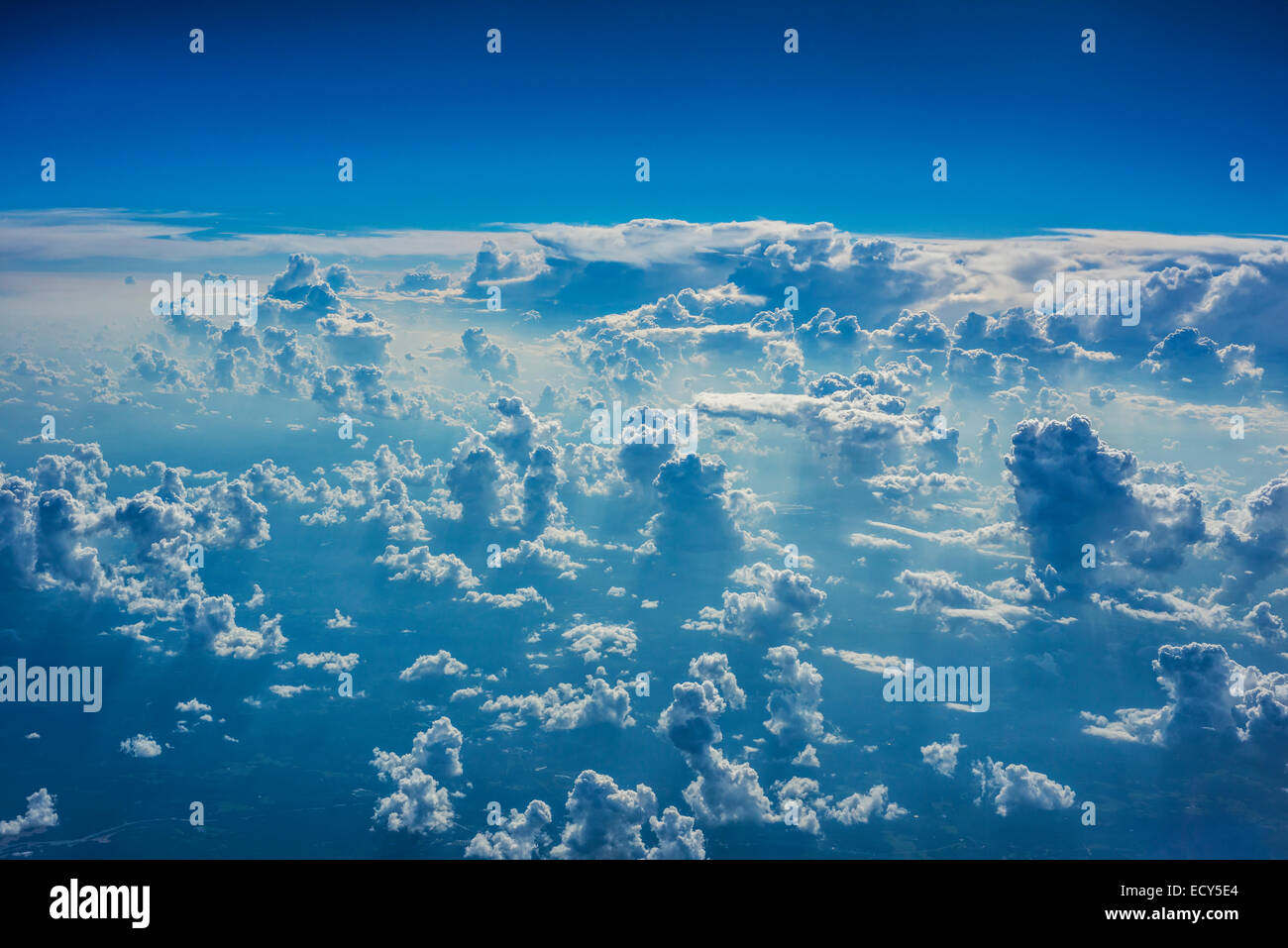 plane flying america usa airport aerial view window clouds high altitude 30 000 ft Stock Photo
