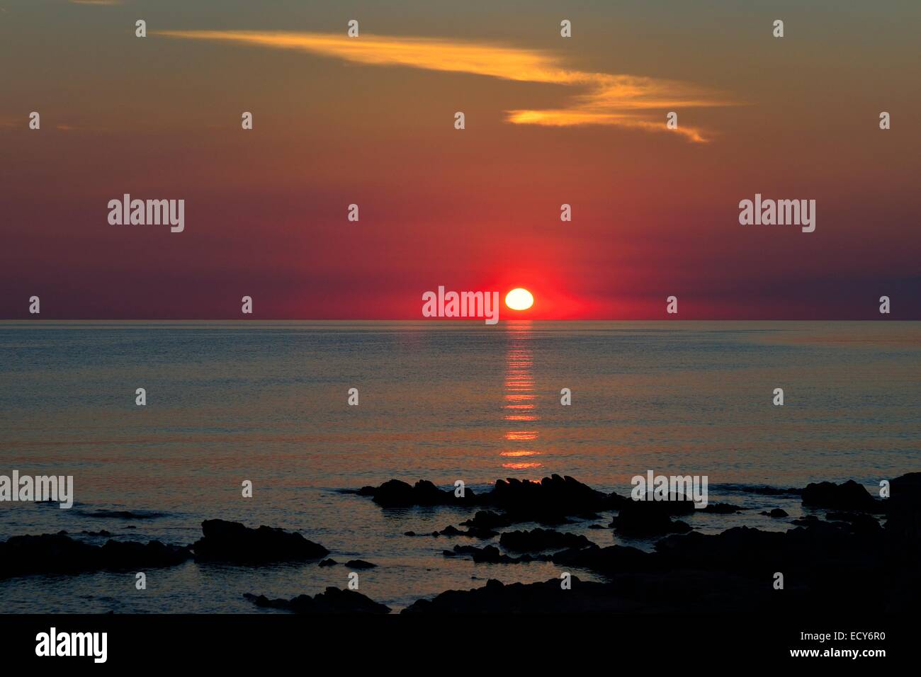 Sunset over the sea, San Teodoro, Province of Olbia-Tempio, Sardinia, Italy Stock Photo