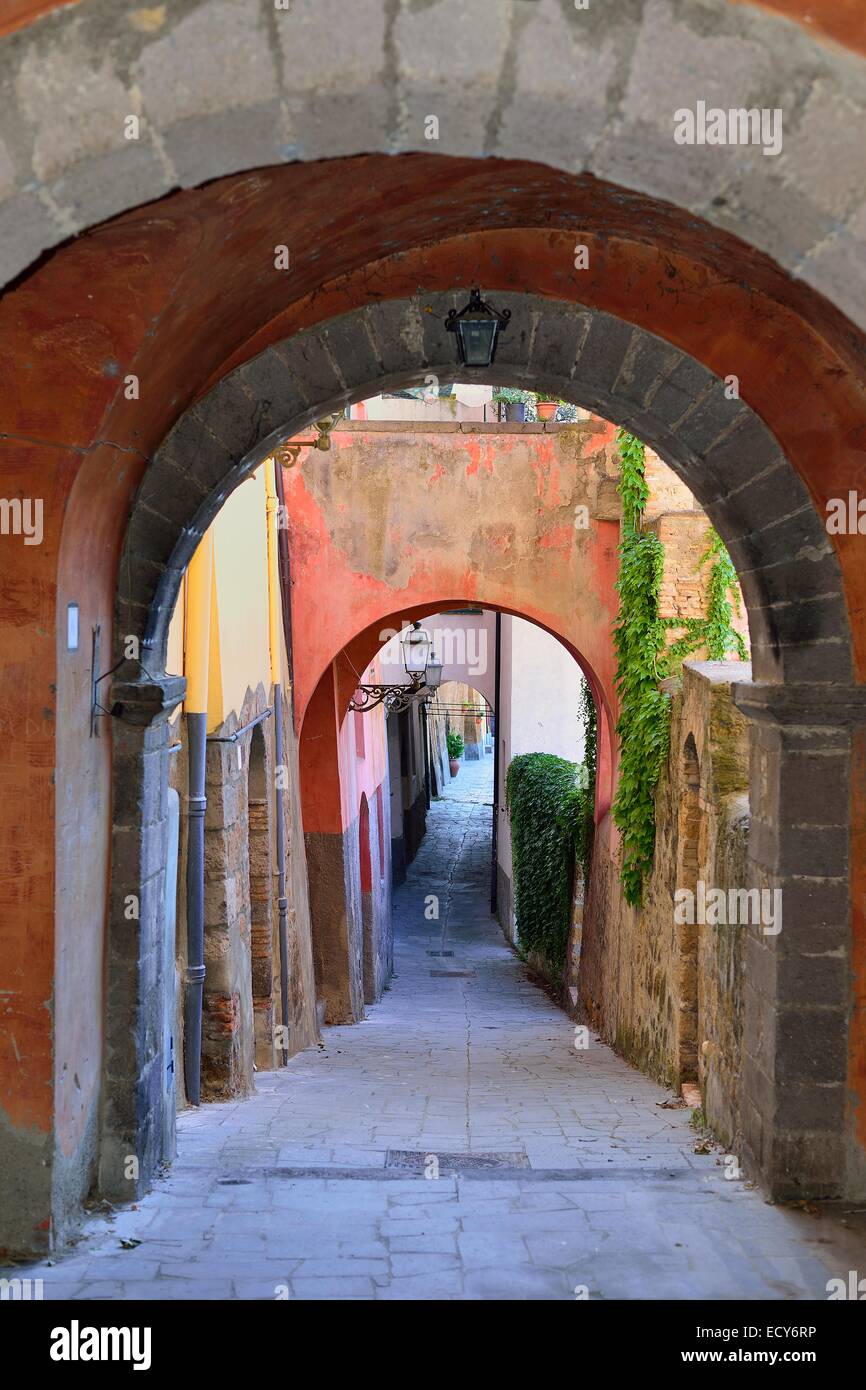 Alley with archways in the old town, Centro Storico, Tuscania, Viterbo, Lazio, Italy Stock Photo