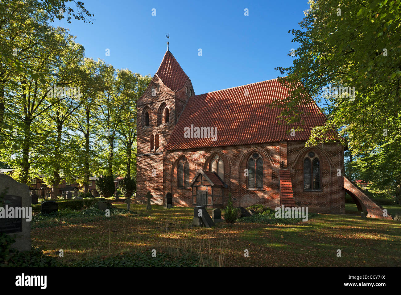 Dorfkirche village church, tower 13th century, nave 15th century, in front the cemetery, Dorf Mecklenburg Stock Photo