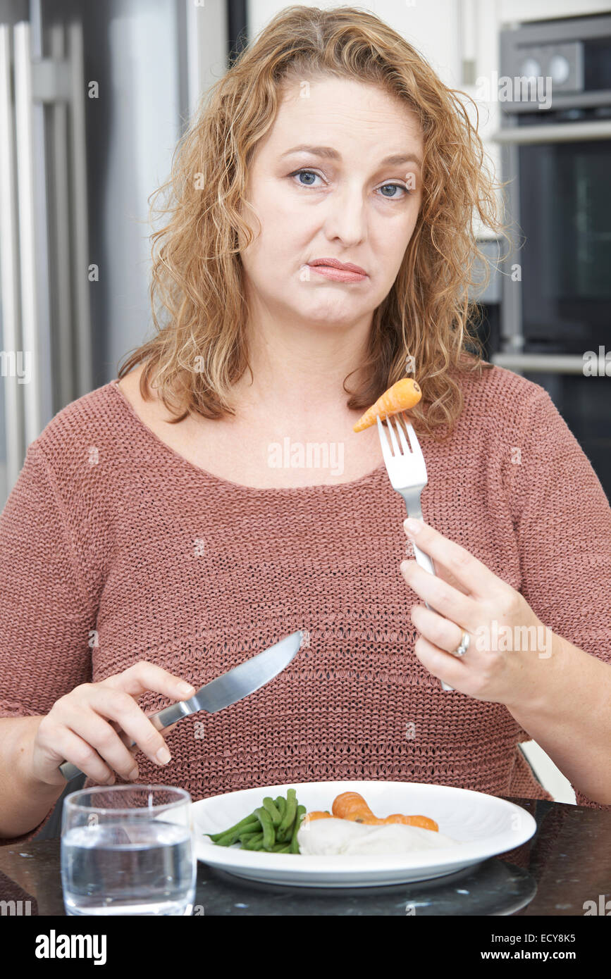 Woman On Diet Fed Up With Eating Healthy Meal Stock Photo