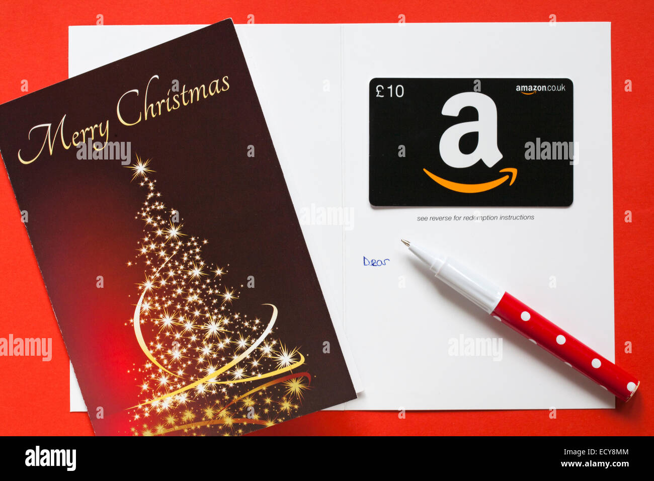 Amazon Merry Christmas giftcard with decorated Christmas tree on gift