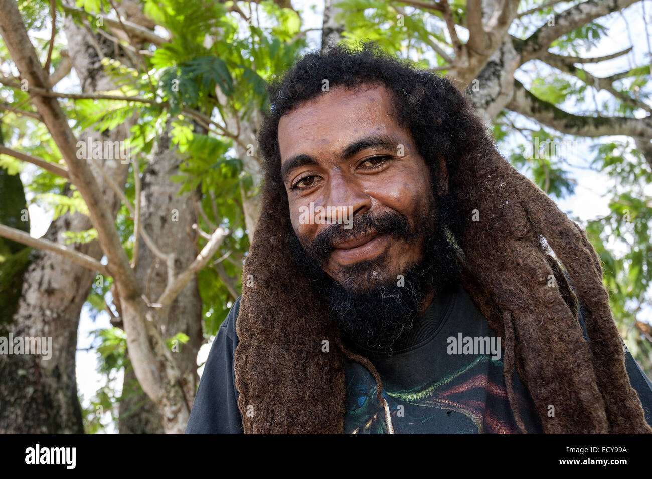 Local man with rasta hair, portrait, Praslin, Seychelles Stock Photo