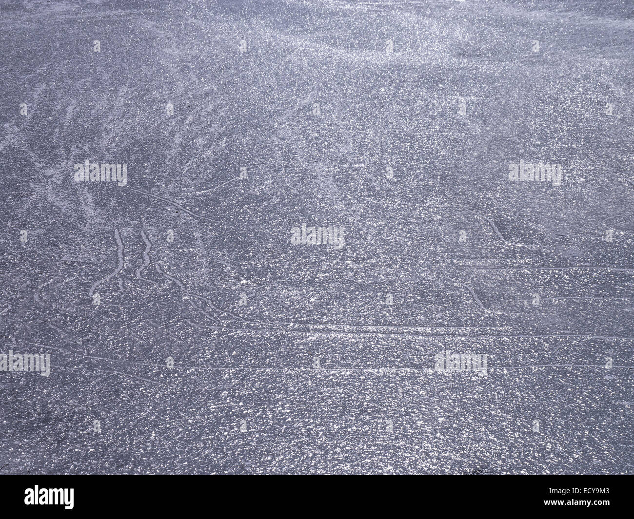 sunreflexion on ice surface of a lake (winter texture) Stock Photo