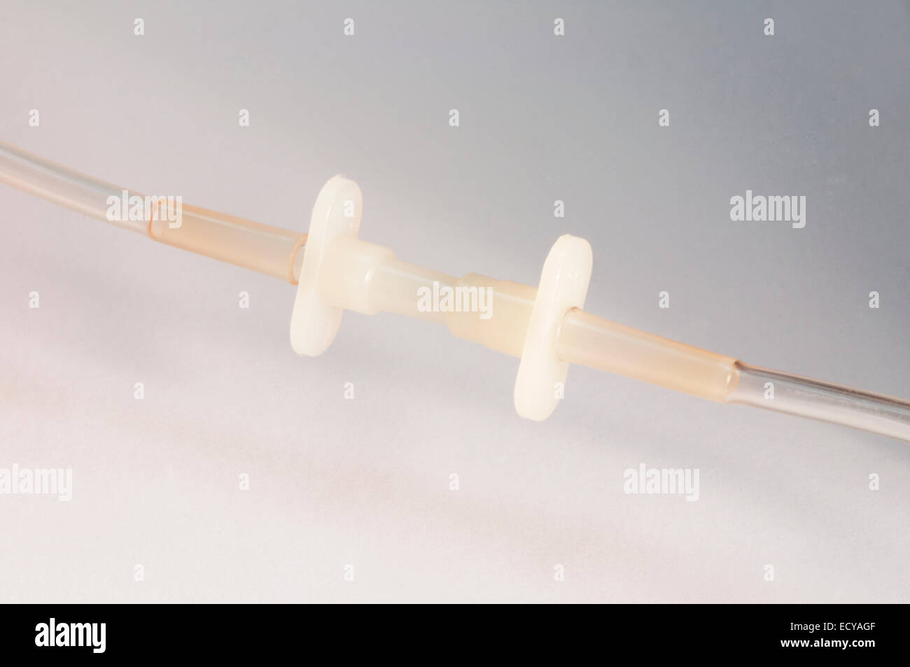 Intravenous line connectors. Stock Photo