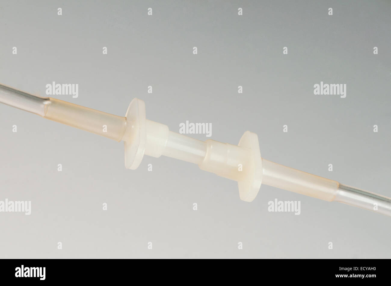 Intravenous line connectors. Stock Photo