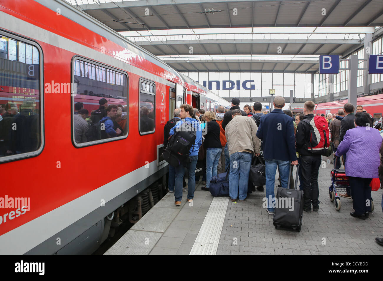 passenger people boarding train germany europe Stock Photo