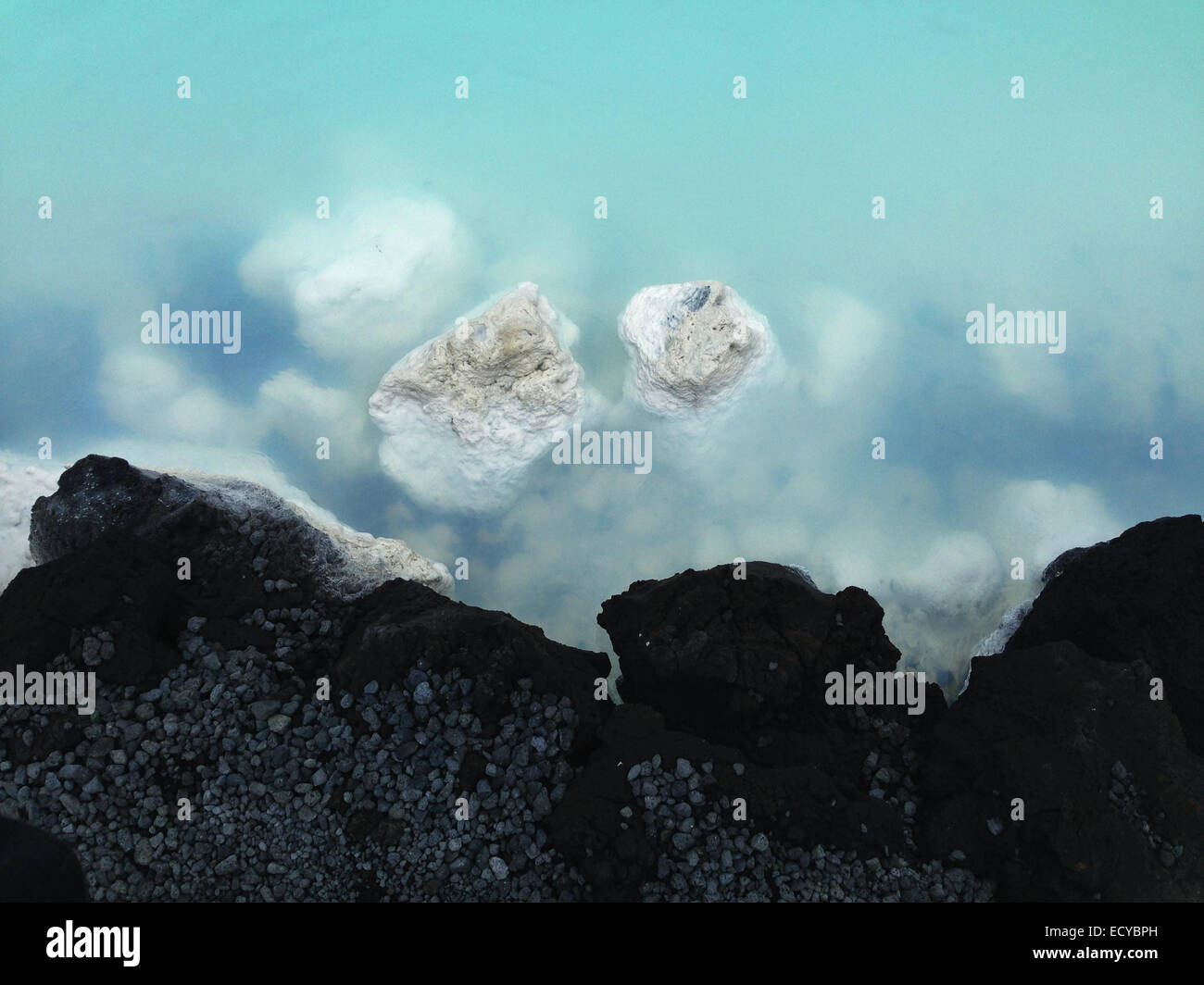 Rock formations in sulfurous geothermal lake - Smartphone Captured Stock Image