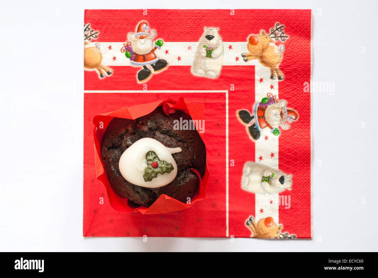 Tesco Merry Christmas Christmas Pudding Muffin on Christmas serviette Stock Photo