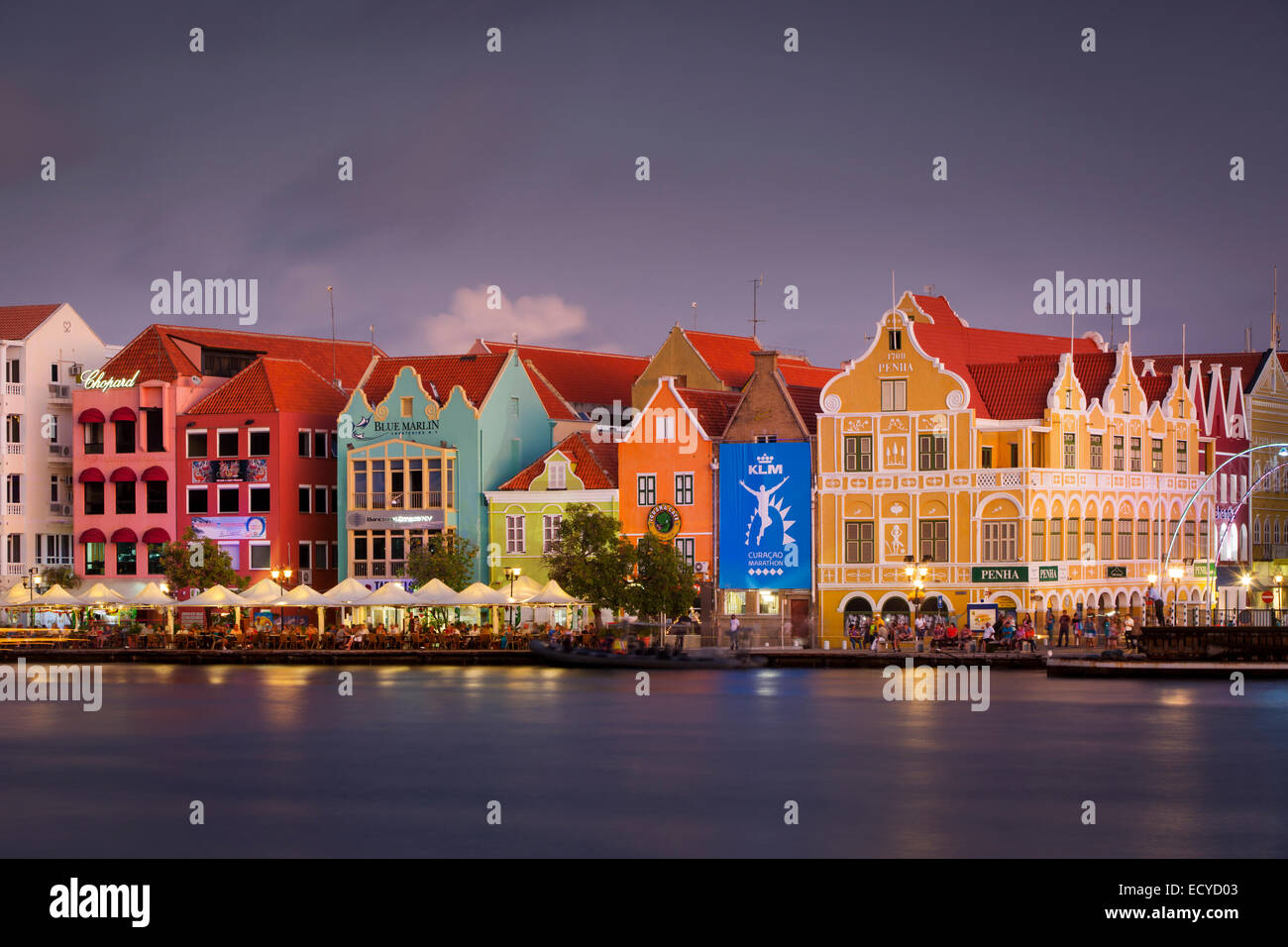Colorful Dutch architecture lines the wharf at Willemstad, Curacao, West Indies Stock Photo