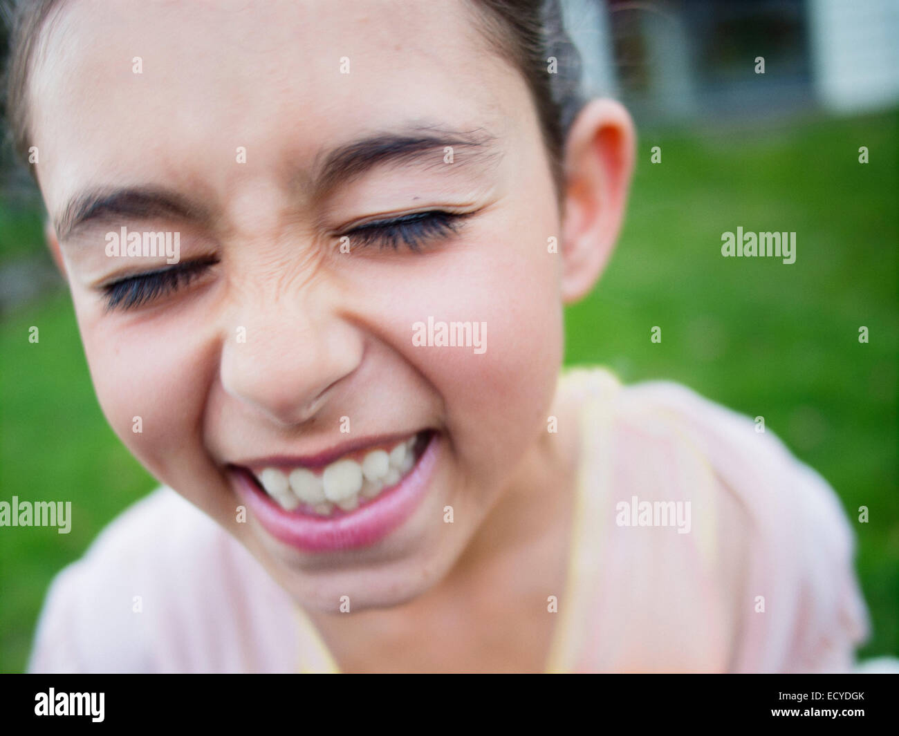 Close up of mixed race girl laughing Stock Photo
