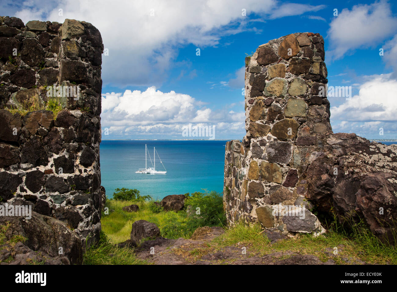 Fort Saint Louis overlooking sailboat in Marigot Bay, Marigot, Saint Martin, West Indies Stock Photo