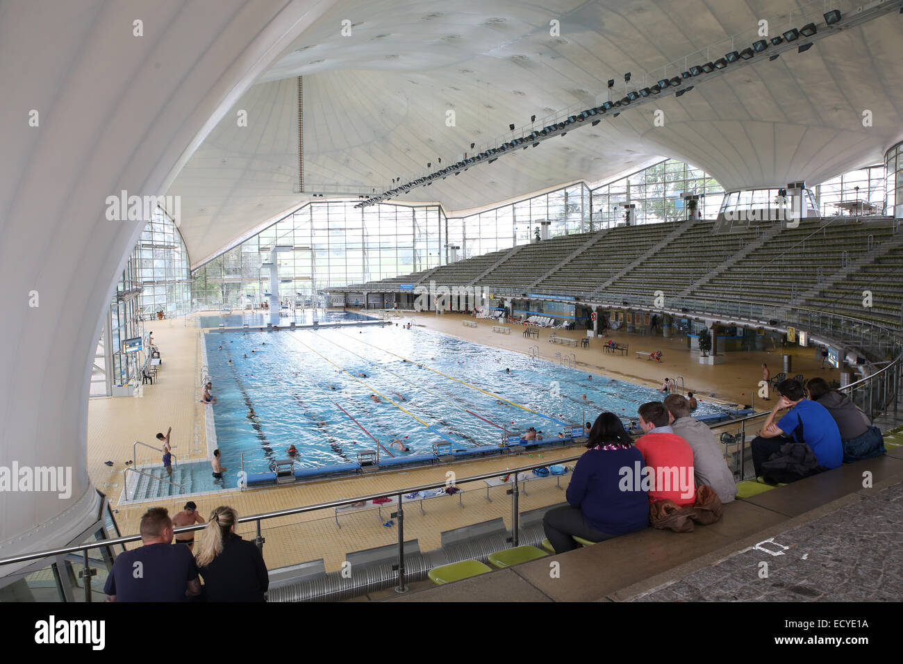 people inside munich Olympic Swim Hall Olympiapark germany Stock Photo