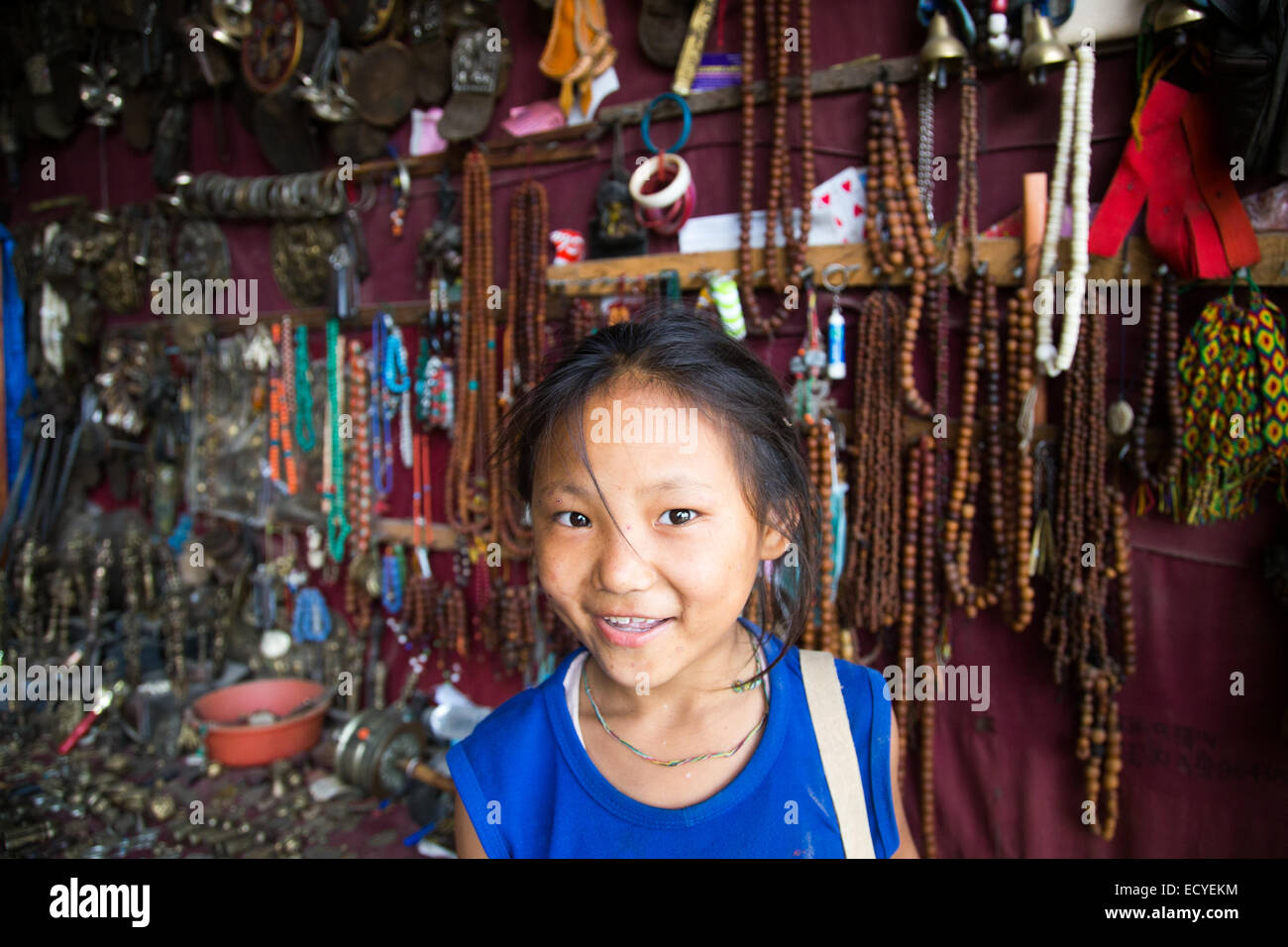 Young girl in her parents souvenir shop in Kathmandu, Nepal Stock Photo