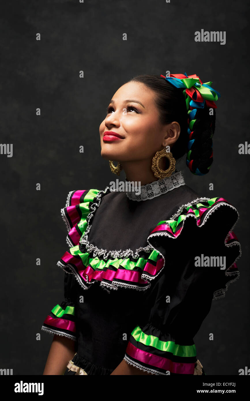 Hispanic teenage girl wearing Jallisco Folkloric dress Stock Photo