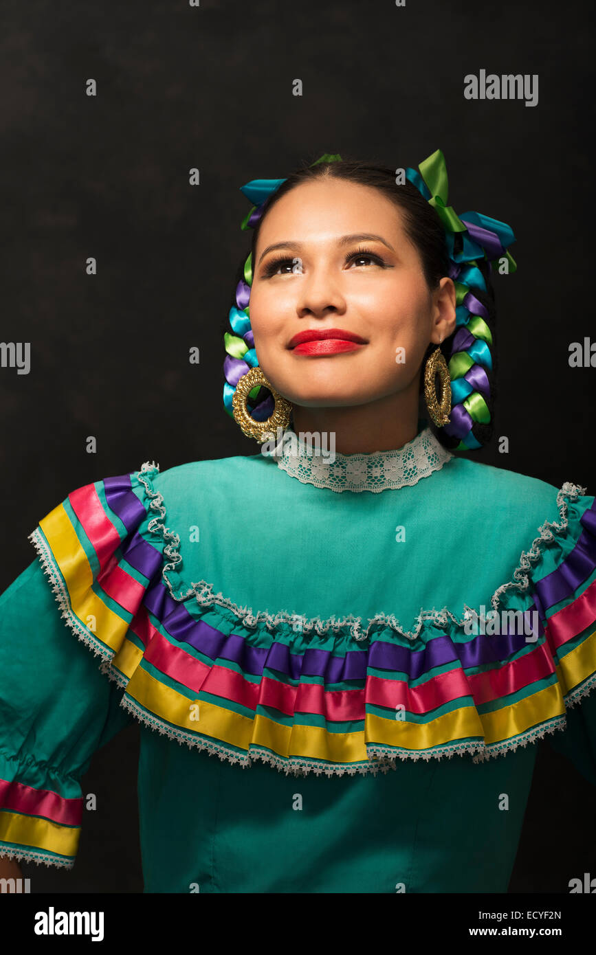 Hispanic teenage girl wearing Puebla Folkloric dress Stock Photo