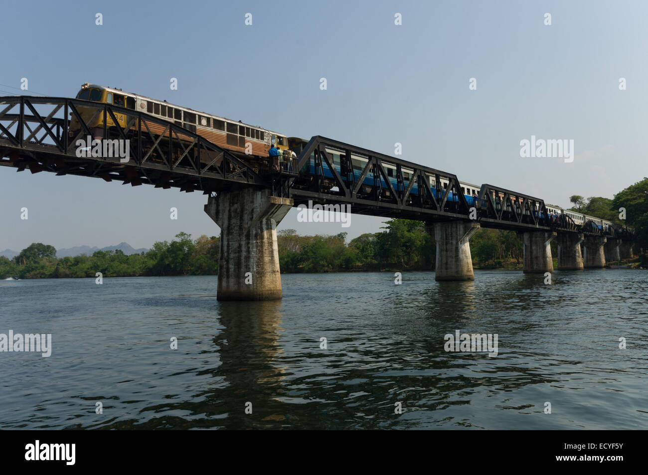 Train crossing the Bridge Over The River Kwai, Kanchanaburi, Thailand Stock Photo
