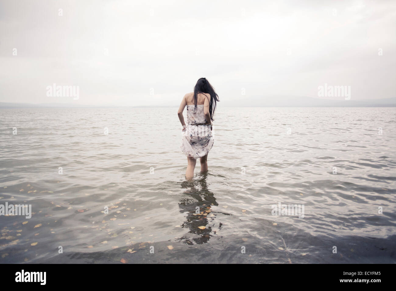 Woman wading in water hires stock photography and images Alamy