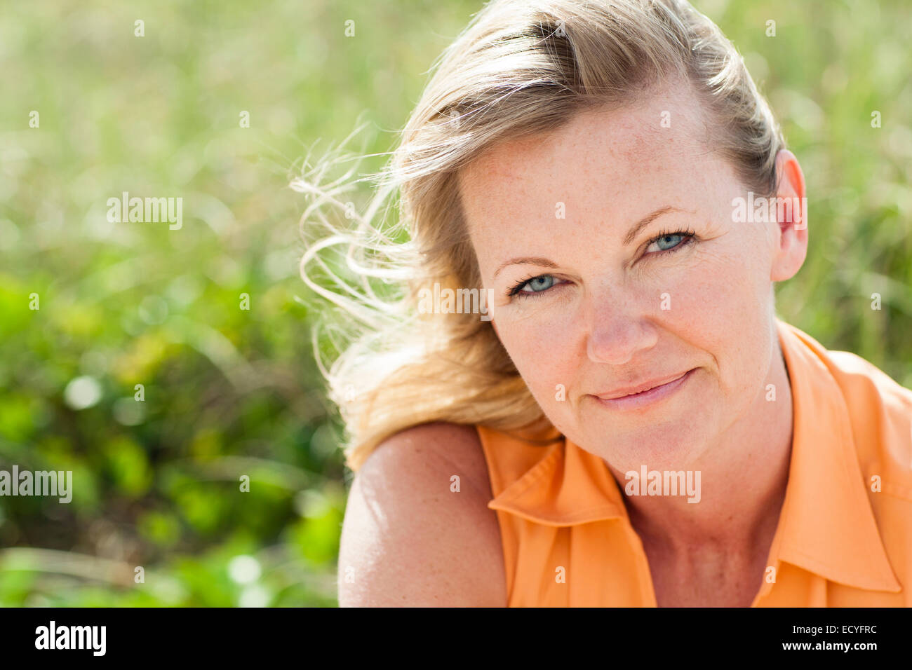 Caucasian woman smiling outdoors Stock Photo