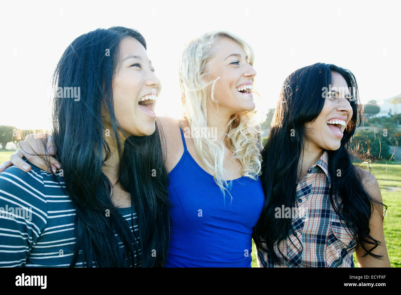 Women laughing outdoors Stock Photo