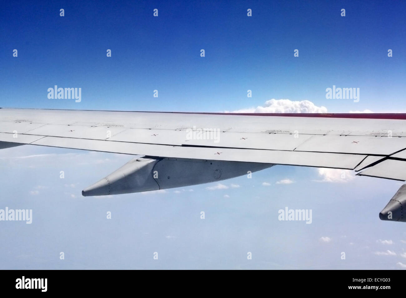 Aerial view of jet plane wing and clouds Stock Photo - Alamy