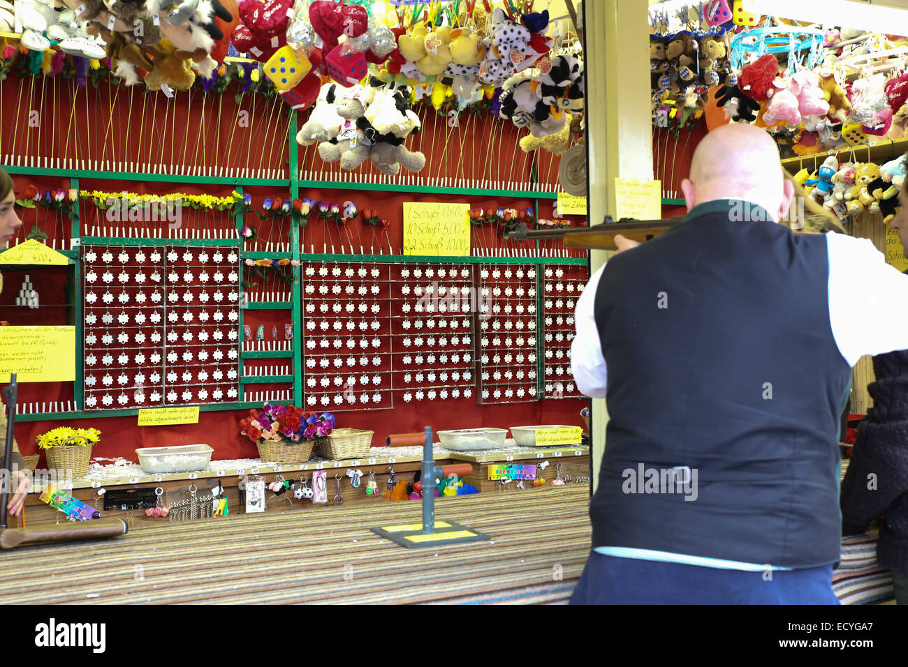 man shooting game amusement park Stock Photo