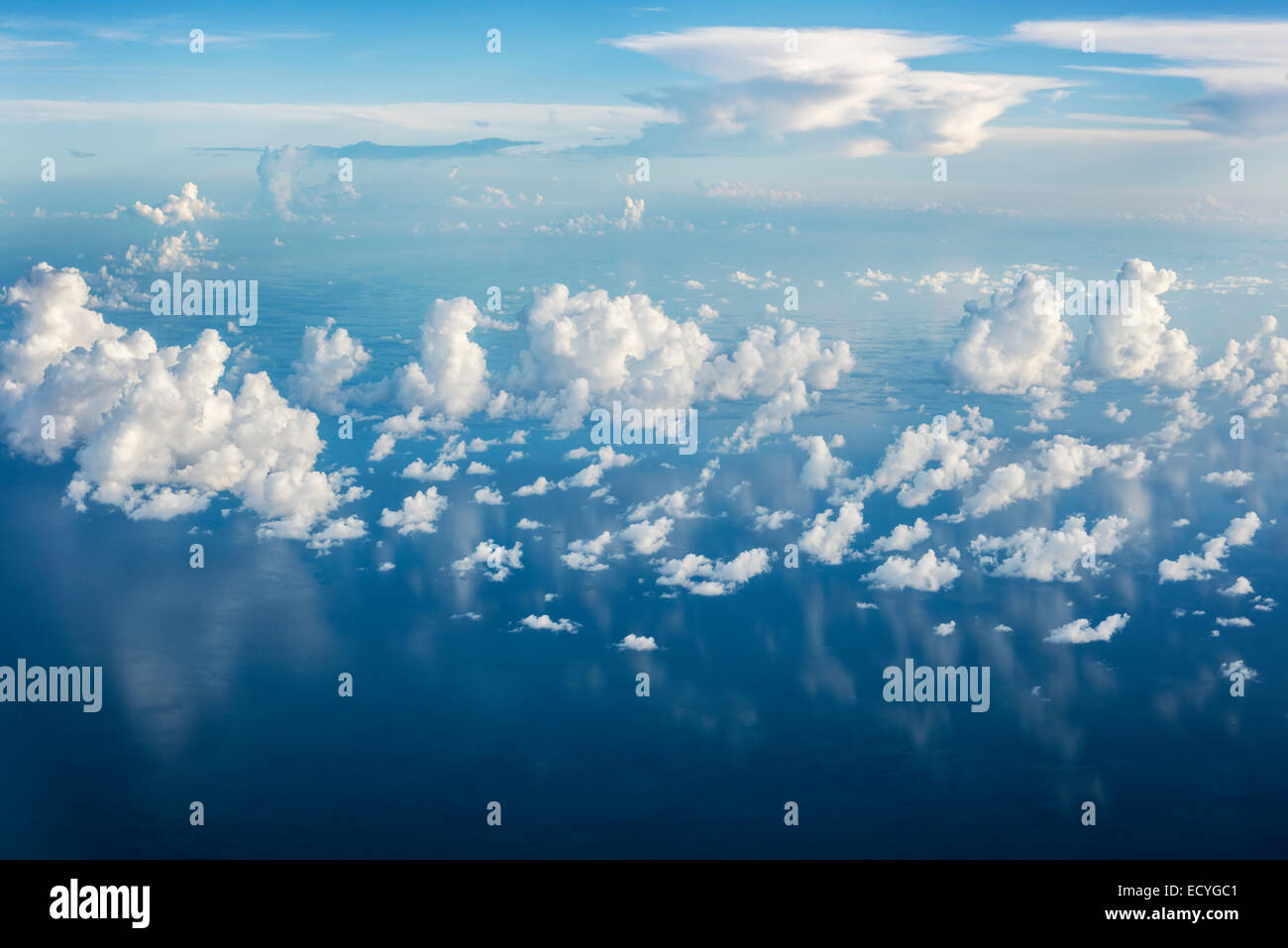 plane flying america usa airport aerial view window clouds high altitude 30 000 ft Stock Photo