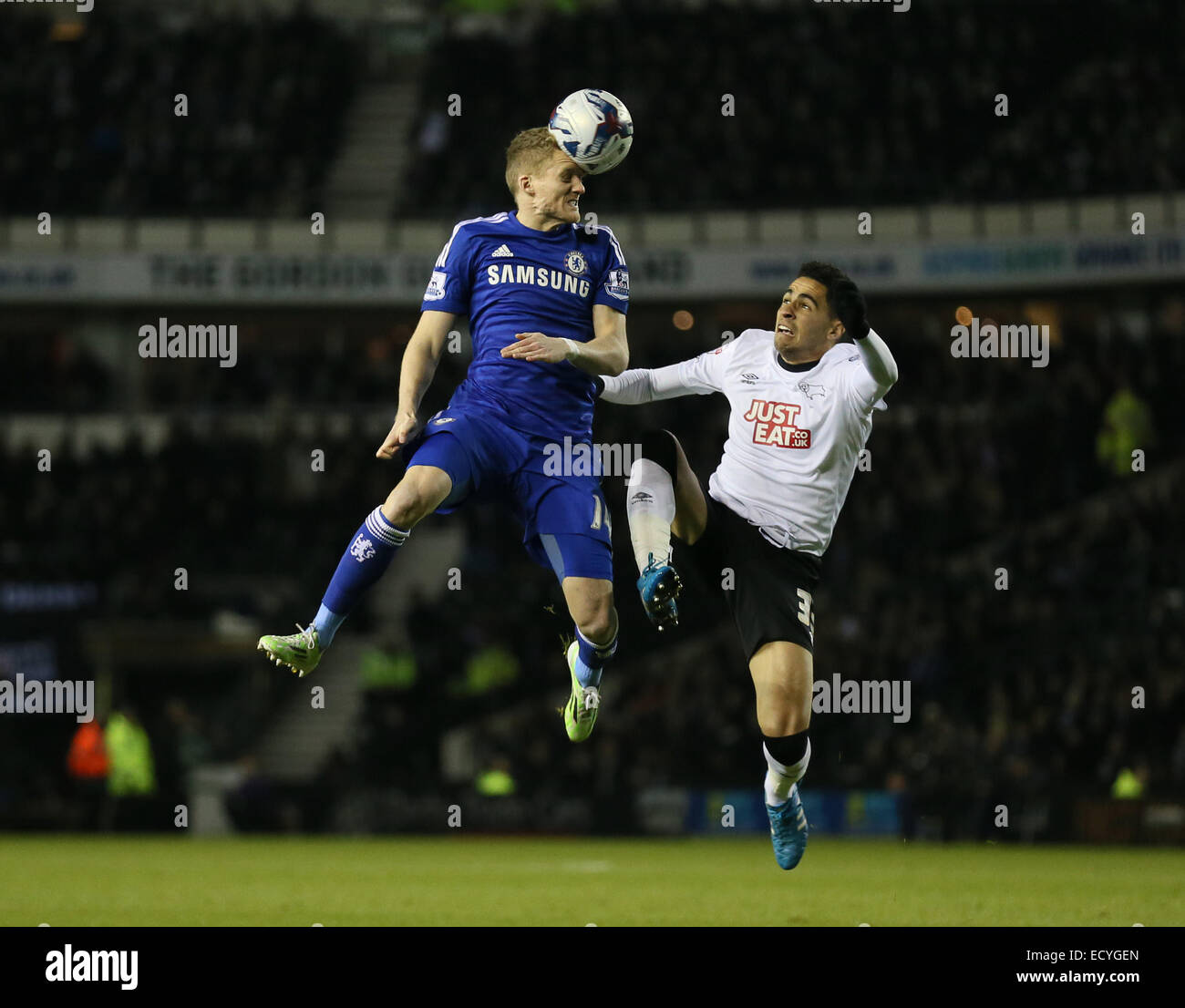 Derby, UK. 16th Dec, 2014. Andre Schurrie of Chelsea tussles with Omar Mascarell of Derby County - Capital One Cup Quarter Final - Derby vs Chelsea - iPro Stadium - Derby - England - 16th December 2014 - Picture Simon Bellis/Sportimage. © csm/Alamy Live News Stock Photo