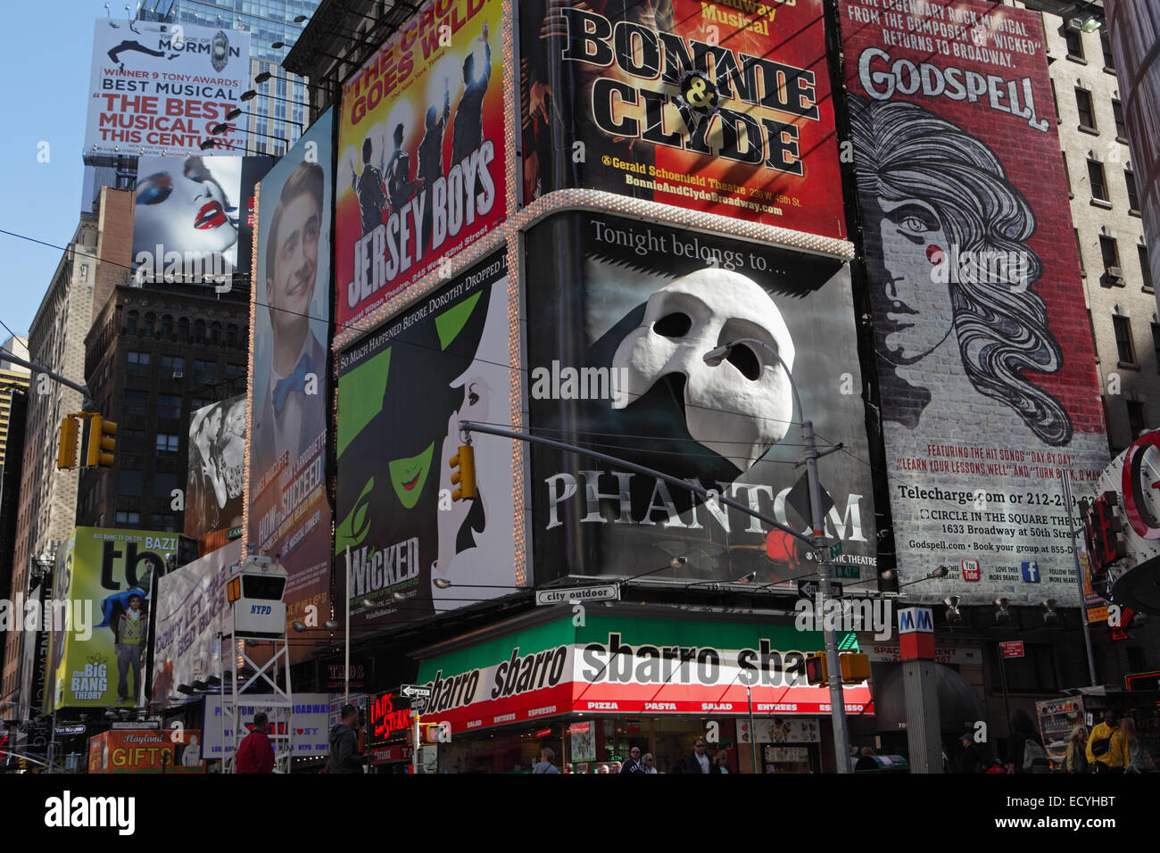 Huge billboards in Times Square New York advertise shows in the theater district along 7th Avenue Stock Photo